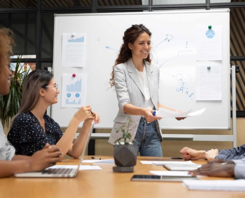 woman giving presentation about financial plan