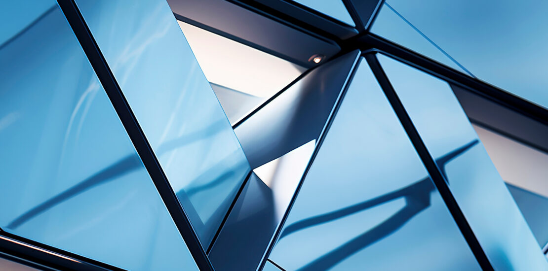 Modern geometrical windows on the outside of an office building.