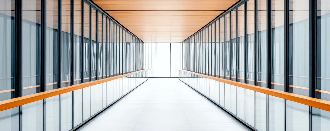 Empty hallway that leads to center of building.
